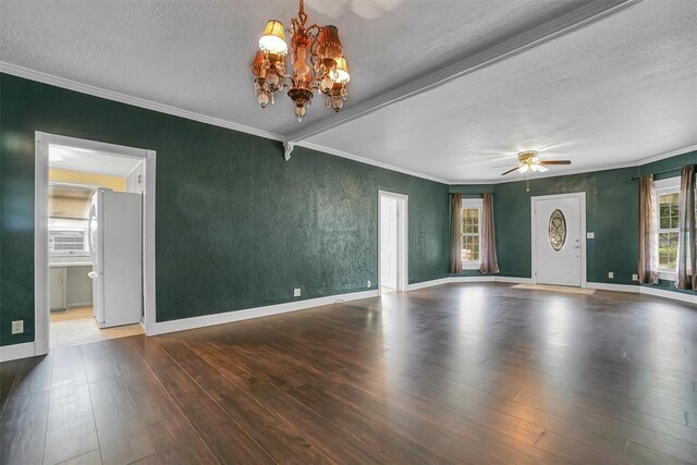 117 W 6th St, Cordell, OK 73632 - unfurnished living room with a chandelier, a textured ceiling, crown molding, wood finished floors, and ceiling fan