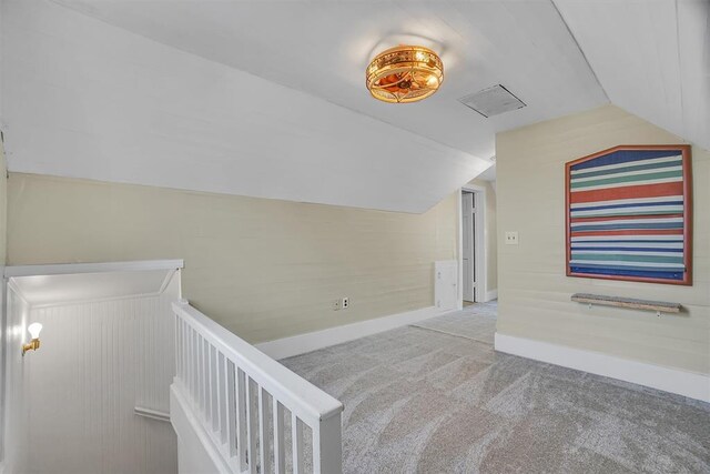 117 W 6th St, Cordell, OK 73632 - stairs with baseboards, lofted ceiling, and carpet floors