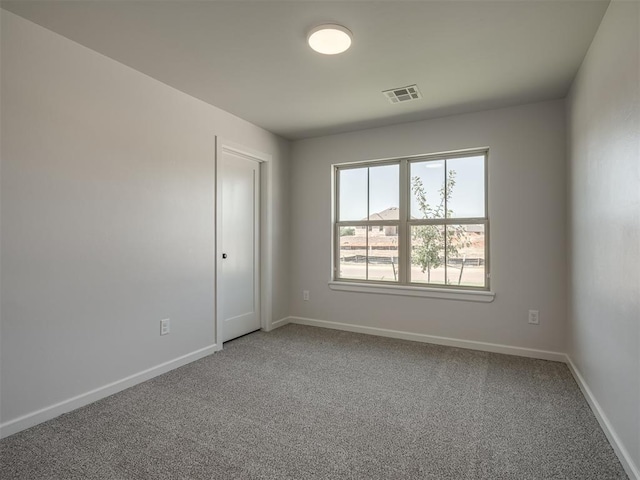 unfurnished room with carpet