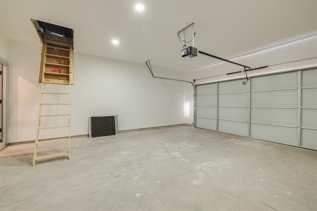 garage featuring a garage door opener