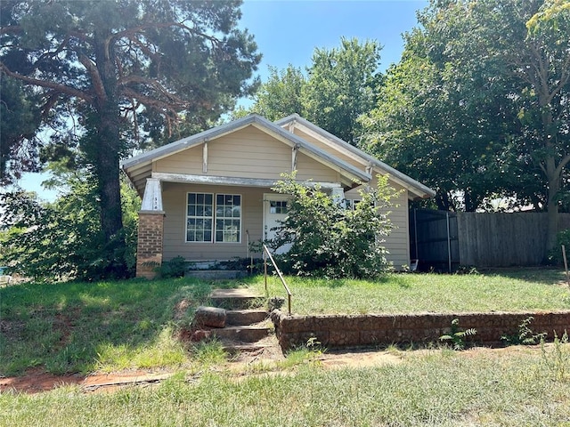 view of front of home with a front yard