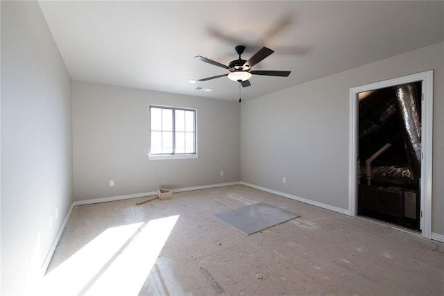 unfurnished room with ceiling fan