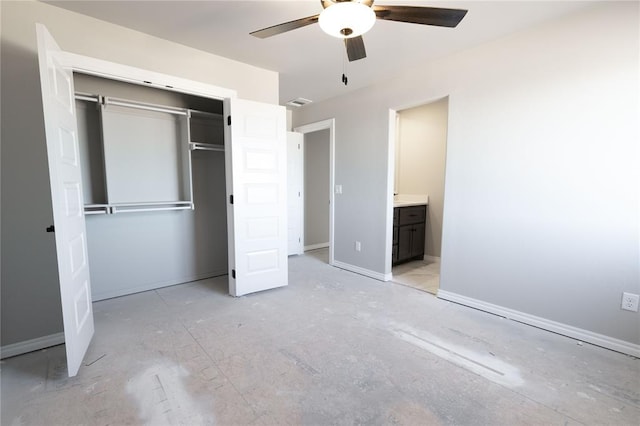 unfurnished bedroom featuring ceiling fan, connected bathroom, and a closet