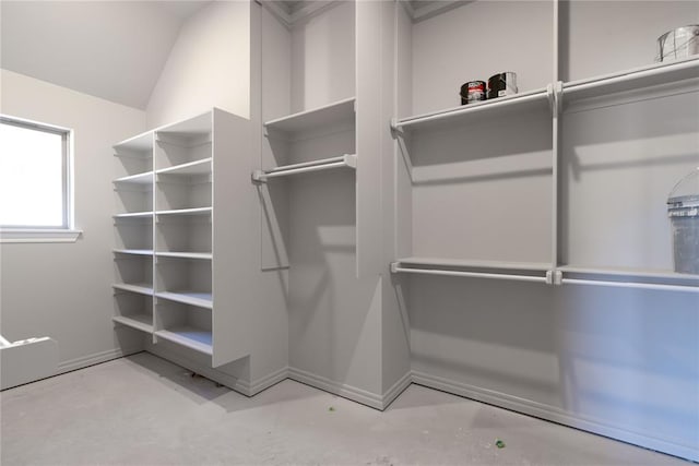 spacious closet featuring vaulted ceiling