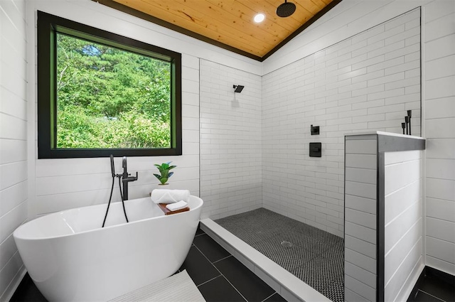 bathroom with shower with separate bathtub, vaulted ceiling, plenty of natural light, and wood ceiling