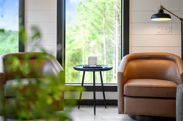 sitting room featuring hardwood / wood-style floors