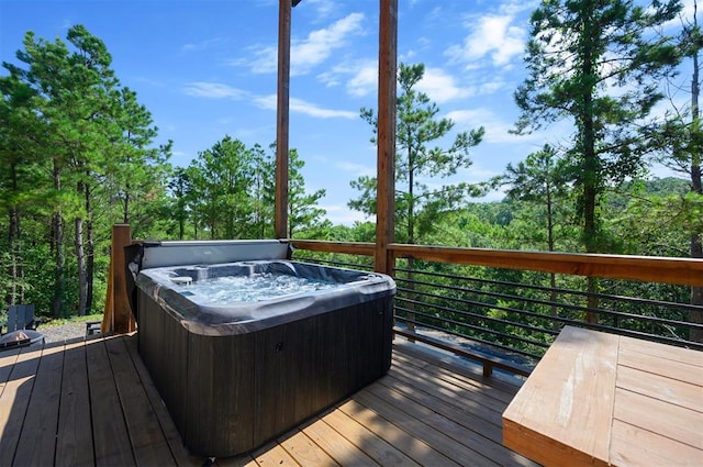 deck with a hot tub