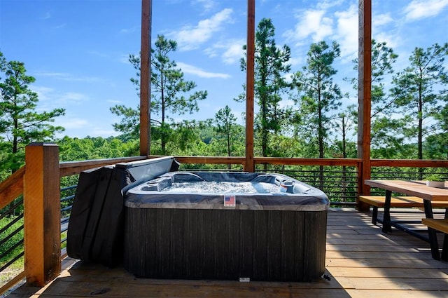 deck with a hot tub