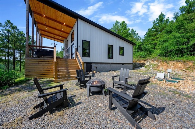 exterior space with an outdoor fire pit