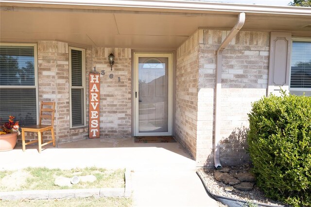 entrance to property with a porch