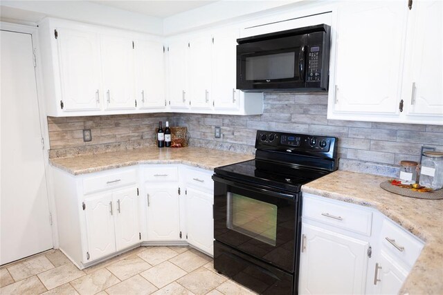 kitchen featuring backsplash, white cabinetry, and black appliances