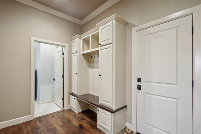 mudroom with dark hardwood / wood-style flooring and ornamental molding