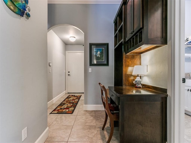 doorway featuring light tile patterned floors