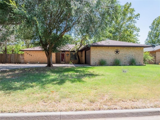 view of front of property with a front lawn