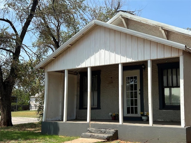 view of home's exterior with covered porch