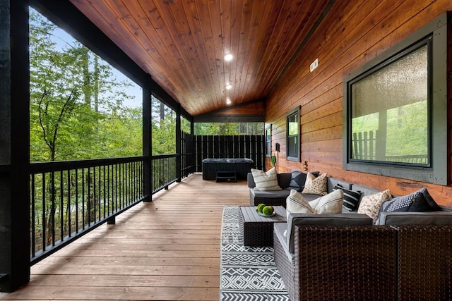 wooden deck with an outdoor hangout area