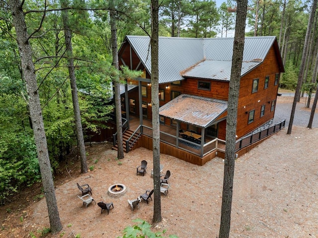 exterior space with a fire pit