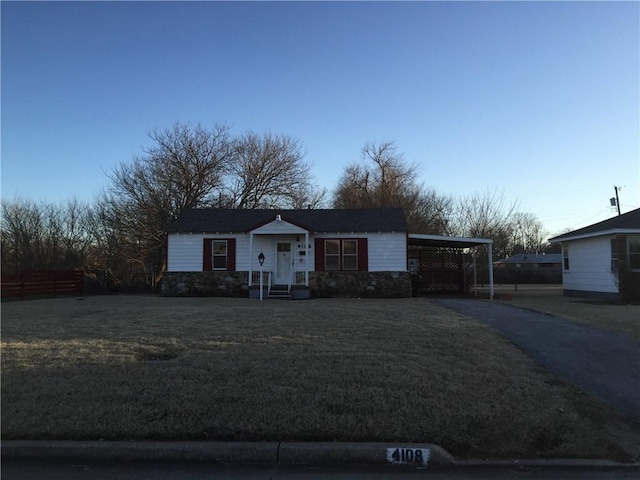 view of front of home with a carport