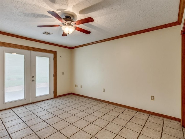 8015 County St Unit 2610, Hinton, OK 73047 - spare room with french doors, a ceiling fan, a textured ceiling, light tile patterned flooring, and crown molding
