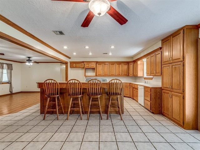 8015 County St Unit 2610, Hinton, OK 73047 - dining area featuring a ceiling fan, light tile patterned flooring, a textured ceiling, recessed lighting, and crown molding