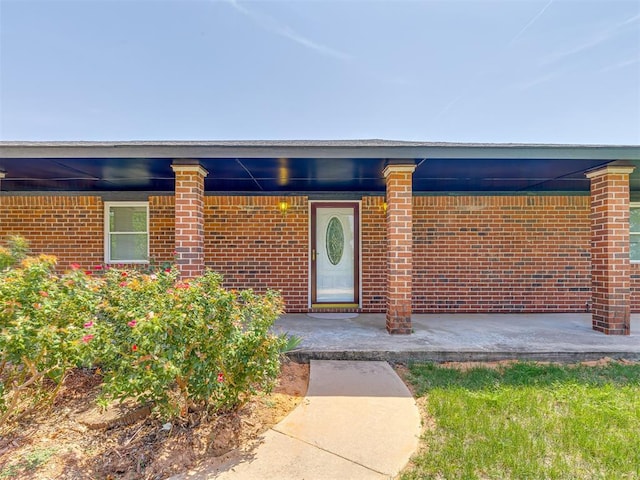 8015 County St Unit 2610, Hinton, OK 73047 - view of exterior entry with brick siding