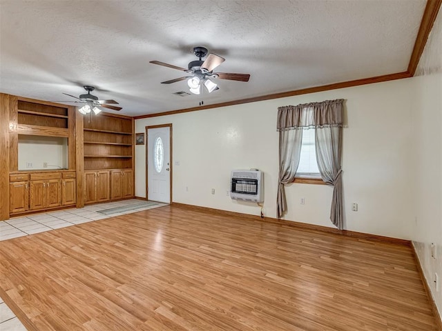 8015 County St Unit 2610, Hinton, OK 73047 - unfurnished living room featuring heating unit, a textured ceiling, a ceiling fan, light wood finished floors, and ornamental molding