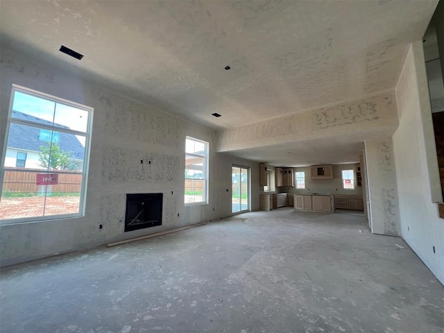 unfurnished living room with a fireplace