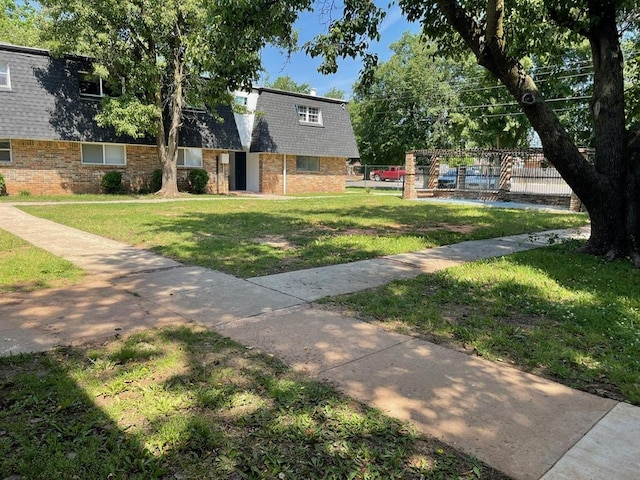 exterior space featuring a lawn