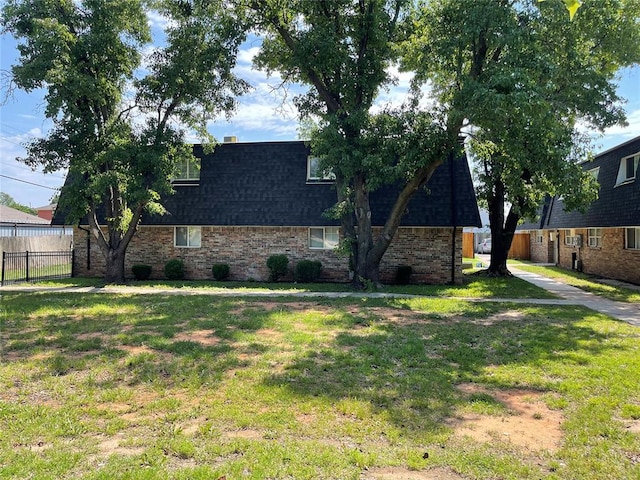 view of property exterior featuring a yard