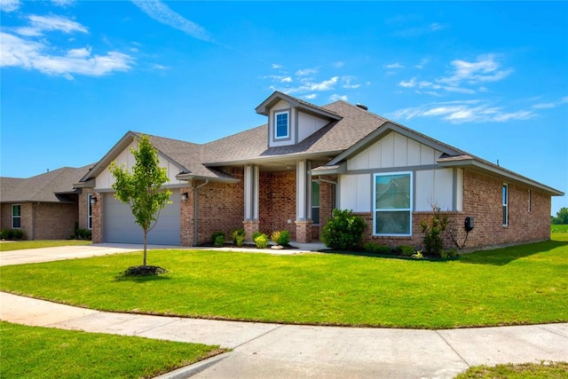 view of front of home with a front lawn and a garage