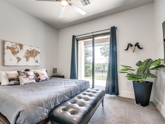 carpeted bedroom with ceiling fan and access to exterior