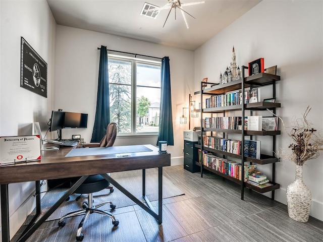 office with a notable chandelier and hardwood / wood-style flooring