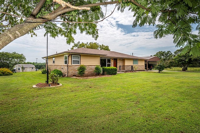 ranch-style home with a front yard