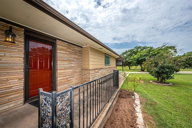 view of property exterior featuring a yard