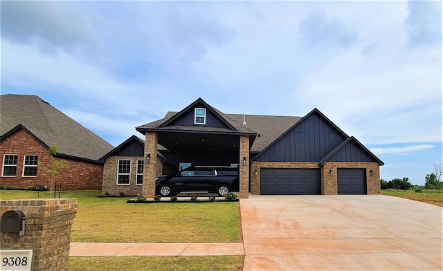 view of front of property with a garage and a front lawn