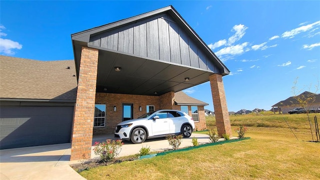 view of vehicle parking with a garage, a carport, and a lawn