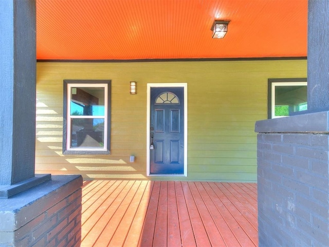 doorway to property with a porch