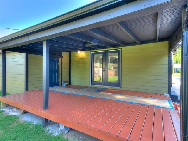 wooden terrace featuring french doors