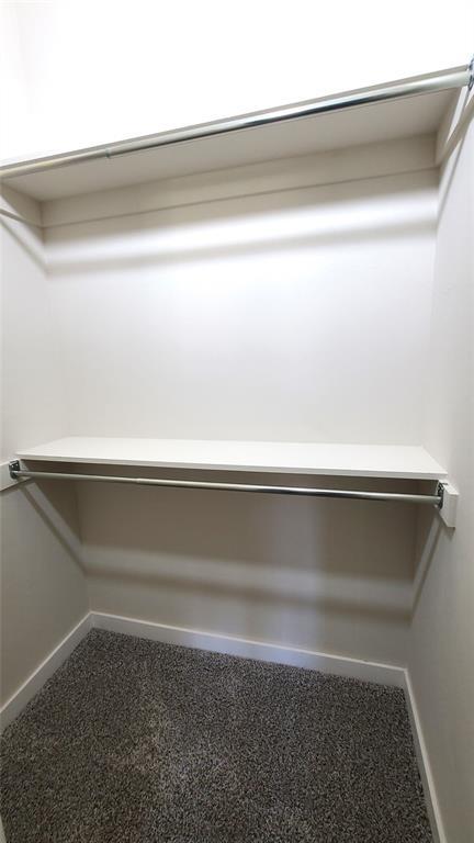 109 Tralee Ct, Yukon, OK 73099 - walk in closet with carpet floors