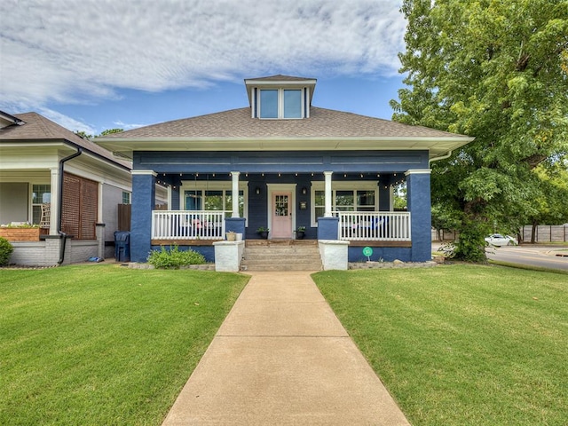 bungalow-style home with a porch and a front yard