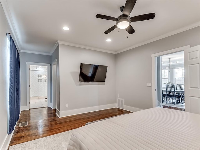 unfurnished bedroom featuring dark hardwood / wood-style flooring, ensuite bathroom, ceiling fan, and ornamental molding