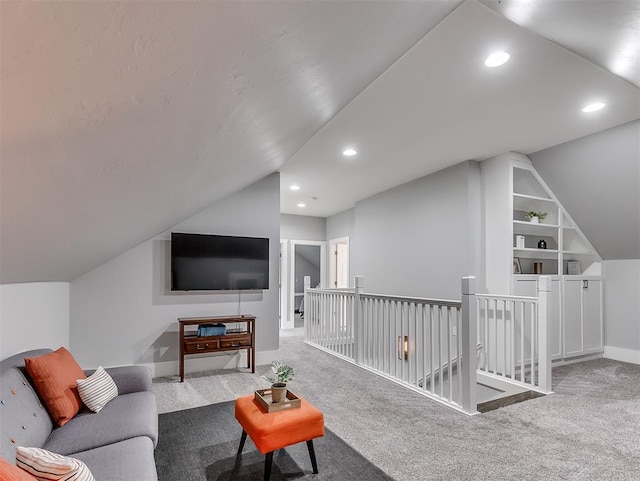 living room with carpet flooring and lofted ceiling