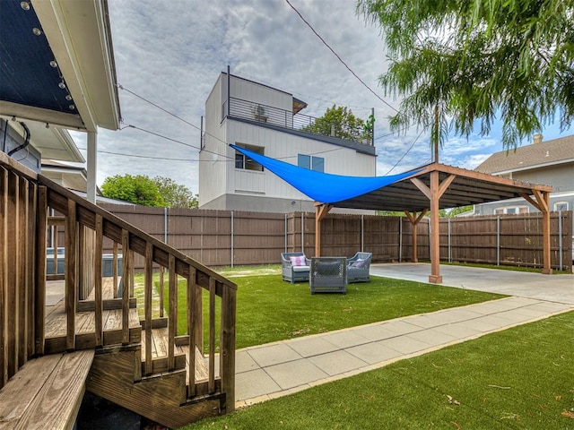 view of yard with a patio area and an outdoor hangout area