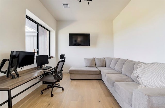 office space featuring light hardwood / wood-style floors