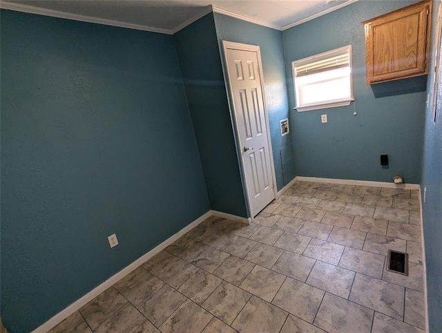 laundry room featuring washer hookup, cabinets, and crown molding