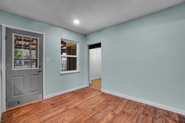 1033 Coe St, Altus, OK 73521 - entryway with baseboards, light wood-style flooring, and recessed lighting
