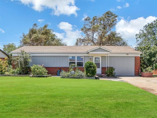 1033 Coe St, Altus, OK 73521 - ranch-style home featuring brick siding, a front yard, board and batten siding, a shingled roof, and concrete driveway