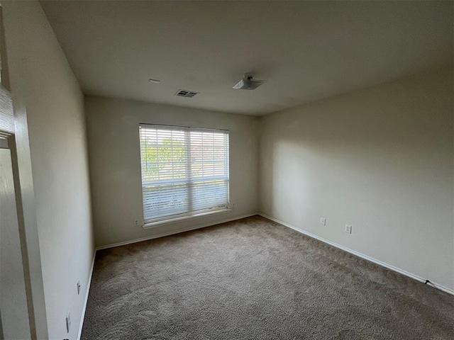 view of carpeted spare room