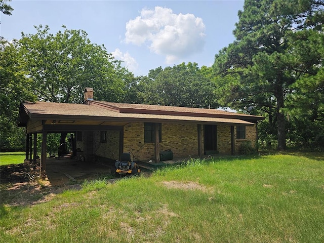 exterior space with a carport