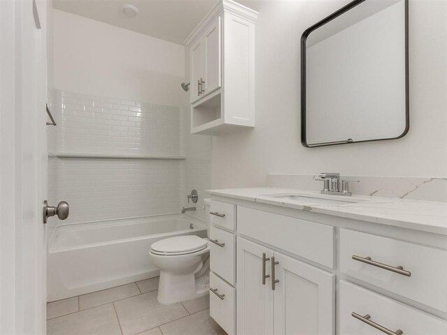 full bathroom with tile patterned flooring, vanity, shower / bathtub combination, and toilet